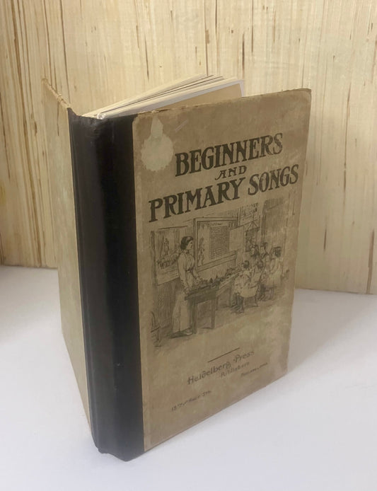 Handbound journal made from a worn Beginners and Primary Songs book cover